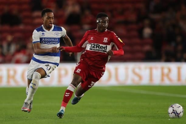Chris Willock of Queens Park Rangers in action with Middlesbrough's Isaiah Jones during the Sky Bet Championship match between Middlesbrough and...