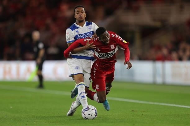 Queens Park Rangers' Moses Odubajo fouls Middlesbrough's Isaiah Jones during the Sky Bet Championship match between Middlesbrough and Queens Park...