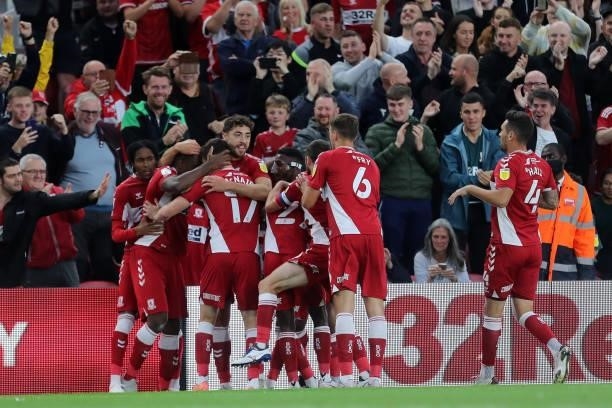 Middlesbrough's Uche Ikpeazu celebrates with his team mates after scoring scores from the penalty spot during the Sky Bet Championship match between...