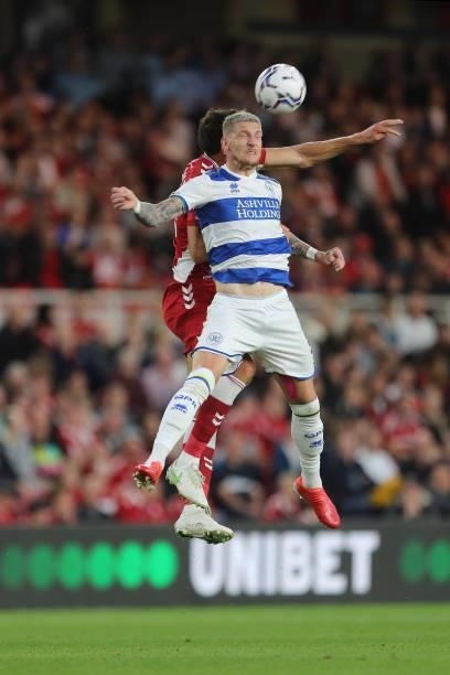 Queens Park Rangers' Jordy de Wijs contests a header with Middlesbrough's Matt Crooks during the Sky Bet Championship match between Middlesbrough and...
