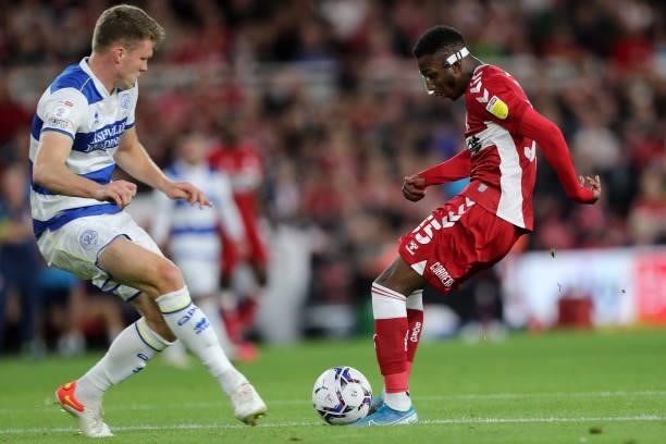 Rob Dickie of Queens Park Rangersin action with Middlesbrough's Isaiah Jones during the Sky Bet Championship match between Middlesbrough and Queens...