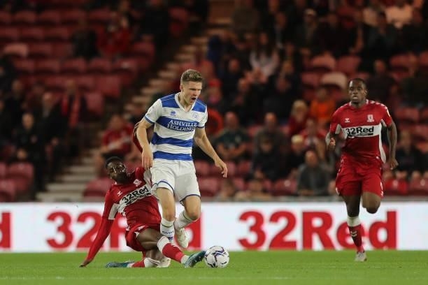 Middlesbrough's Isaiah Jonesin action with Queens Park Rangers' Rob Dickie during the Sky Bet Championship match between Middlesbrough and Queens...