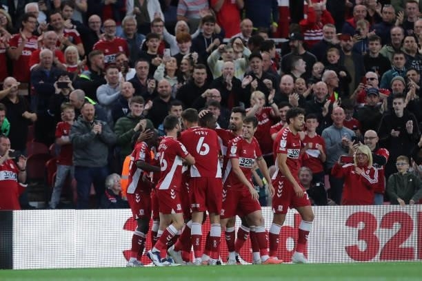 Middlesbrough's Uche Ikpeazu celebrates with his team mates after scoring scores from the penalty spot during the Sky Bet Championship match between...