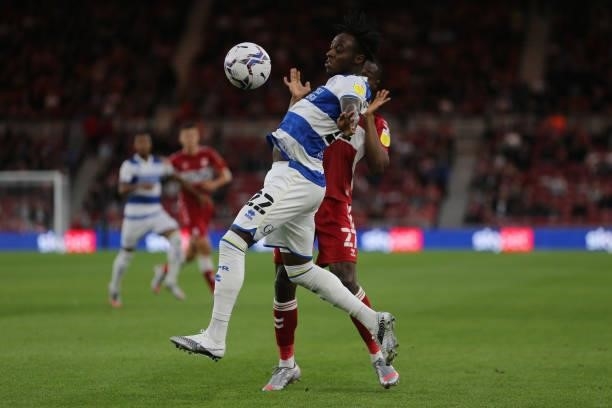 Queens Park Rangers' Moses Odubajo battles with Middlesbrough's Marc Bola during the Sky Bet Championship match between Middlesbrough and Queens Park...