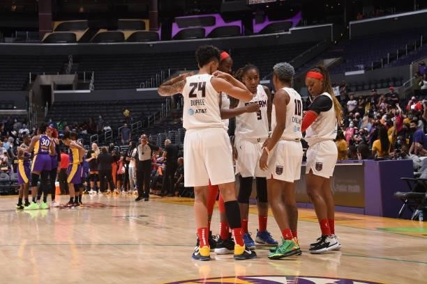 The Los Angeles Sparks and the Atlanta Dream huddle up before the game on August 19, 2021 at the Staples Center in Los Angeles, California. NOTE TO...
