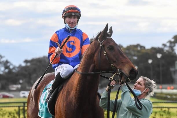 Daniel Stackhouse returns to the mounting yard on Toosbuy after winning the Catanach's Jewellers BM64 Handicap at Bendigo Racecourse on August 20,...
