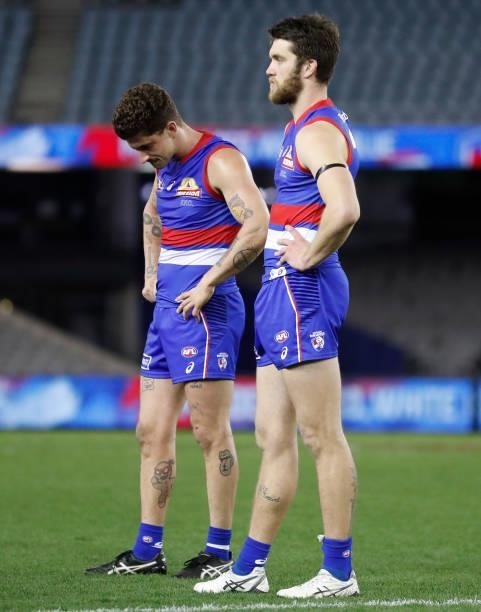 Tom Liberatore and Bailey Williams of the Bulldogs look dejected after a loss during the 2021 AFL Round 23 match between the Western Bulldogs and the...