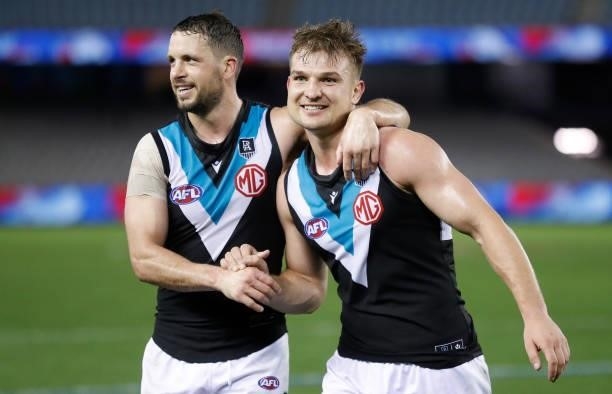 Travis Boak and Ollie Wines of the Power celebrate during the 2021 AFL Round 23 match between the Western Bulldogs and the Port Adelaide Power at...