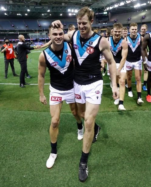 Karl Amon and Tom Jonas of the Power celebrate during the 2021 AFL Round 23 match between the Western Bulldogs and the Port Adelaide Power at Marvel...