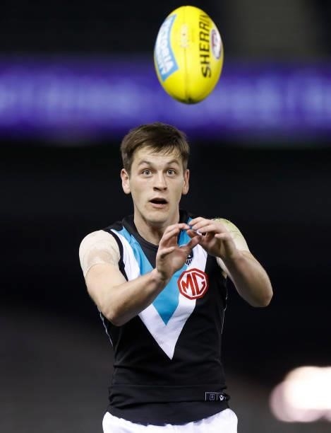 Zak Butters of the Power marks the ball during the 2021 AFL Round 23 match between the Western Bulldogs and the Port Adelaide Power at Marvel Stadium...