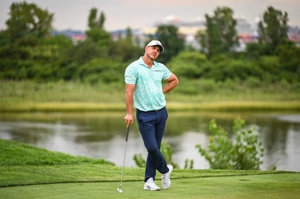 Brooks Koepka reacts after making a bogey on the 18th hole green during the second round of THE NORTHERN TRUST, the first event of the FedExCup...