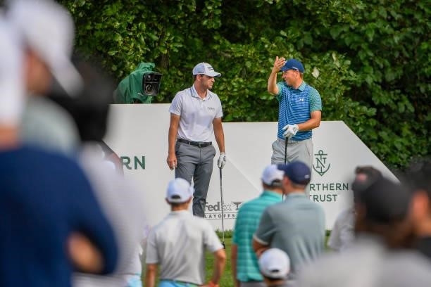 Jordan Spieth and Patrick Cantlay chat the 16th tee during the second round of THE NORTHERN TRUST at Liberty National Golf Club on August 20, 2021 in...