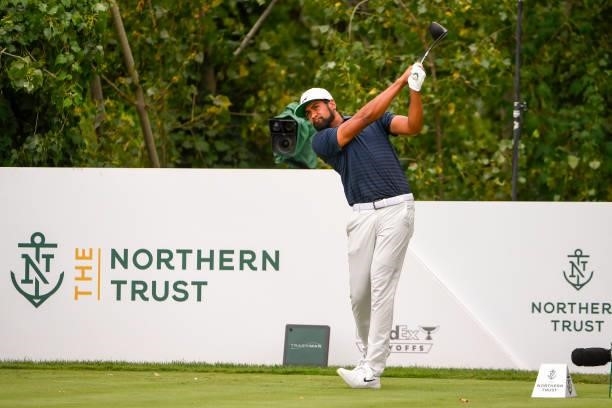 Tony Finau hits his tee shot at the 18th hole during the second round of THE NORTHERN TRUST at Liberty National Golf Club on August 20, 2021 in...