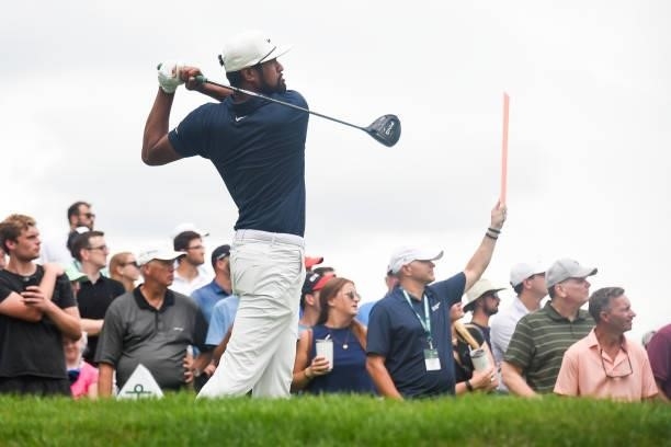 Tony Finau hits his tee shot on the 17th hole during the second round of THE NORTHERN TRUST at Liberty National Golf Club on August 20, 2021 in...