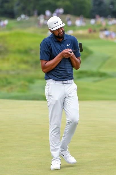 Tony Finau looks down the line of his putter at the 17th hole during the second round of THE NORTHERN TRUST at Liberty National Golf Club on August...