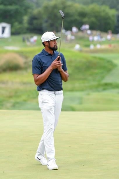 Tony Finau lifts his putter at the 17th hole during the second round of THE NORTHERN TRUST at Liberty National Golf Club on August 20, 2021 in Jersey...