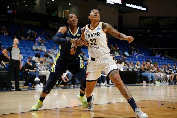 Kayla Thornton of the Dallas Wings plays defense on Emma Cannon of Indiana Fever during the game on August 20, 2021 at the College Park Center in...