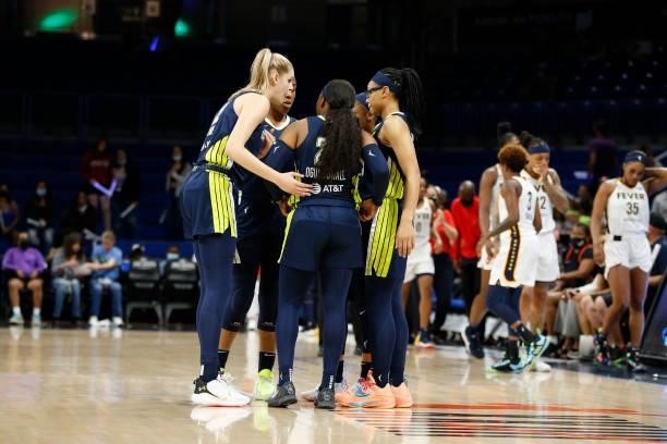 The Dallas Wings huddle up before the game against the Indiana Fever on August 20, 2021 at the College Park Center in Arlington, TX. NOTE TO USER:...