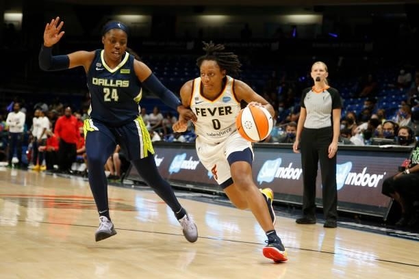 Kelsey Mitchell of the Indiana Fever drives to the basket during the game against the Dallas Wings on August 20, 2021 at the College Park Center in...