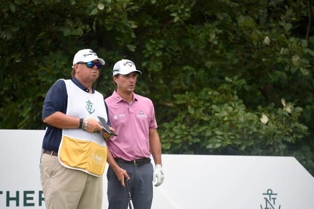 Kevin Kisner is seen with his caddie on the 16th hole during the second round of THE NORTHERN TRUST at Liberty National Golf Club on August 20, 2021...