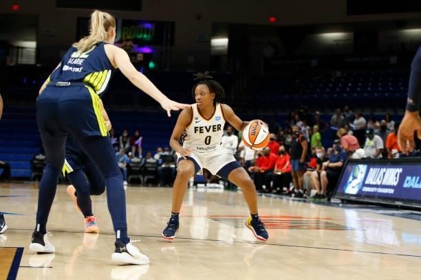 Kelsey Mitchell of the Indiana Fever handles the ball during the game against the Dallas Wings on August 20, 2021 at the College Park Center in...