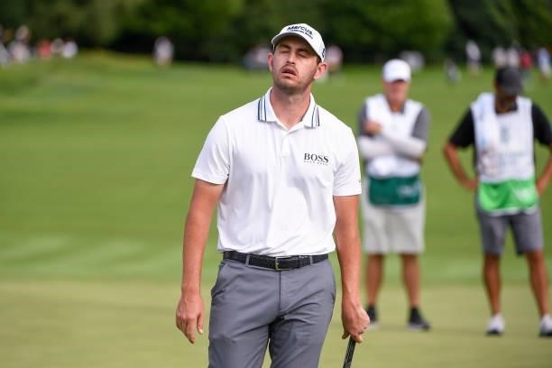 Patrick Cantlay reacts to missing his putt at the 15th green during the second round of THE NORTHERN TRUST at Liberty National Golf Club on August...