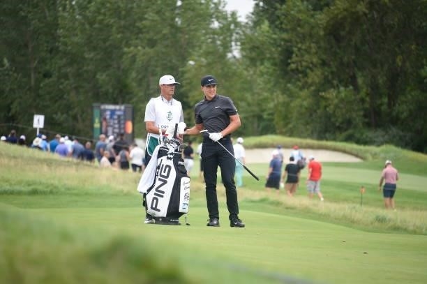 Cameron Champ is seen with his caddie on the third fairway during the second round of THE NORTHERN TRUST at Liberty National Golf Club on August 20,...