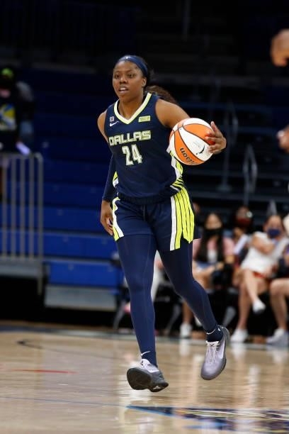 Arike Ogunbowale of the Dallas Wings dribbles the ball during the game against the Indiana Fever on August 20, 2021 at the College Park Center in...