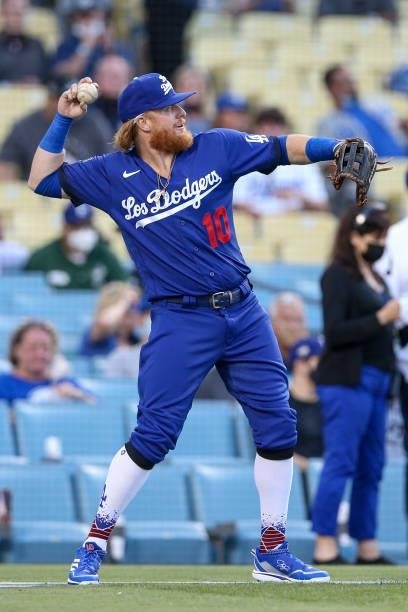 Justin Turner of the Los Angeles Dodgers warms up prior to the game between the New York Mets and the Los Angeles Dodgers at Dodgers Stadium on...
