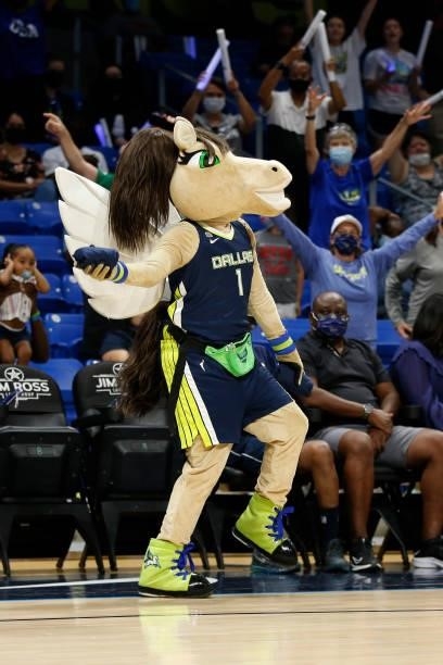 Mascot, Lightning of the Dallas Wings hands out shirts during the game against the Indiana Fever on August 20, 2021 at the College Park Center in...