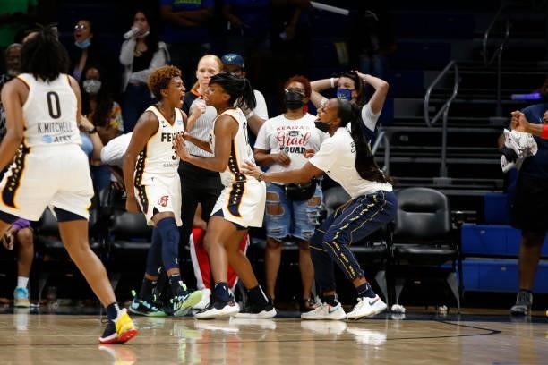 Danielle Robinson of the Indiana Fever celebrates during the game against the Dallas Wings on August 20, 2021 at the College Park Center in...