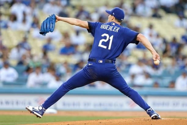 Walker Buehler of the Los Angeles Dodgers pitches during the game between the New York Mets and the Los Angeles Dodgers at Dodgers Stadium on Friday,...
