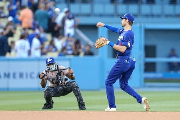 Trea Turner of the Los Angeles Dodgers warms up prior to the game between the New York Mets and the Los Angeles Dodgers at Dodgers Stadium on Friday,...