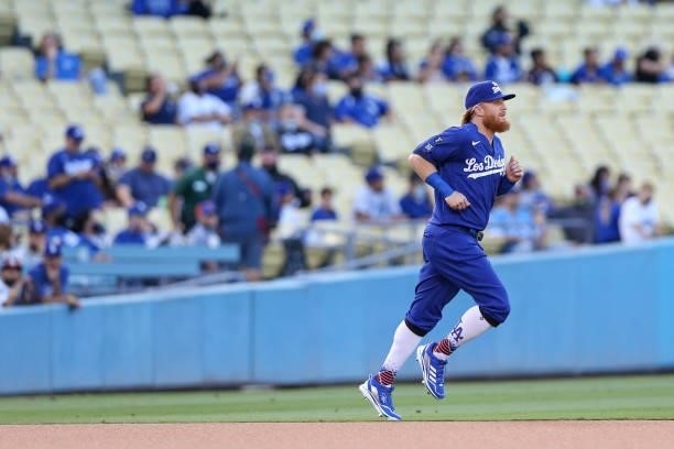 Justin Turner of the Los Angeles Dodgers warms up prior to the game between the New York Mets and the Los Angeles Dodgers at Dodgers Stadium on...