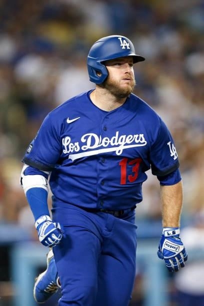 Max Muncy of the Los Angeles Dodgers runs to first after hitting a two-run double during the game between the New York Mets and the Los Angeles...