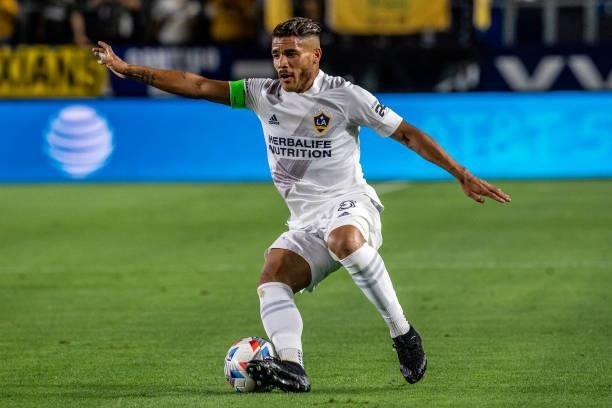 Jonathan dos Santos of Los Angeles Galaxy controls the ball during the game against San Jose Earthquakes at the Dignity Health Sports Park on August...