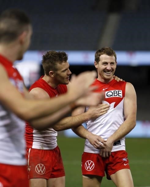 Luke Parker and Harry Cunningham of the Swans celebrate during the 2021 AFL Round 23 match between the Sydney Swans and the Gold Coast Suns at Marvel...