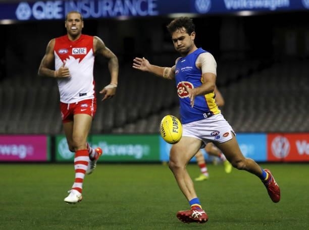 Jarrod Harbrow of the Suns kicks the ball during the 2021 AFL Round 23 match between the Sydney Swans and the Gold Coast Suns at Marvel Stadium on...