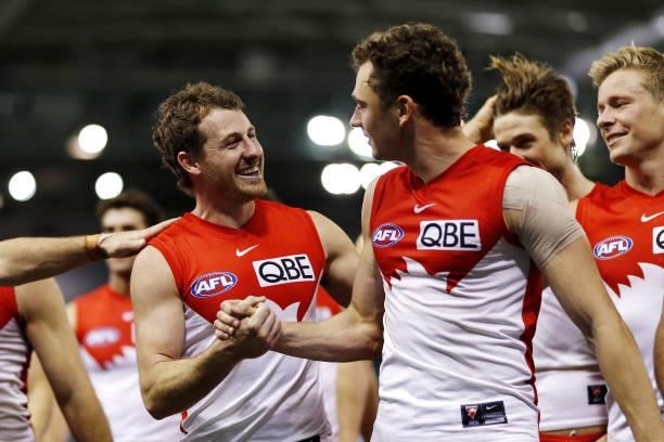Harry Cunningham of the Swans celebrates with Will Hayward during the 2021 AFL Round 23 match between the Sydney Swans and the Gold Coast Suns at...