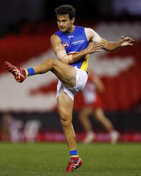 Jarrod Harbrow of the Suns kicks the ball during the 2021 AFL Round 23 match between the Sydney Swans and the Gold Coast Suns at Marvel Stadium on...