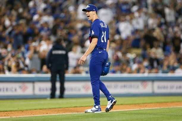 Walker Buehler of the Los Angeles Dodgers reacts during the game between the New York Mets and the Los Angeles Dodgers at Dodgers Stadium on Friday,...