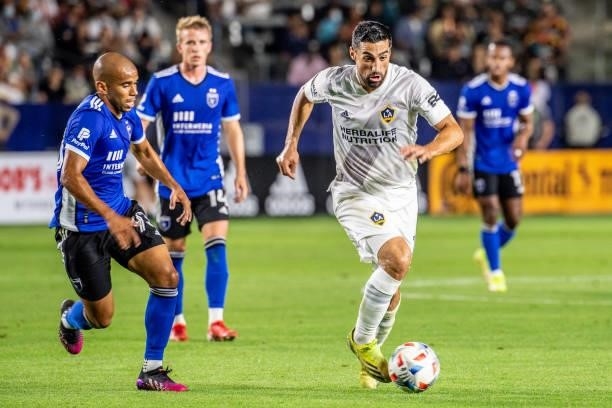 Sebastian Lletget of Los Angeles Galaxy controls the ball against Judson of the San Jose Earthquakes defends during the game at the Dignity Health...