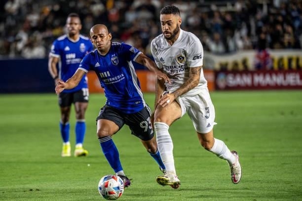 Derrick Williams of Los Angeles Galaxy and Judson of the San Jose Earthquakes compete for the ball during the game at the Dignity Health Sports Park...