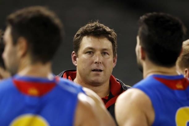 Stuart Dew, Senior Coach of the Suns addresses his players during the 2021 AFL Round 23 match between the Sydney Swans and the Gold Coast Suns at...