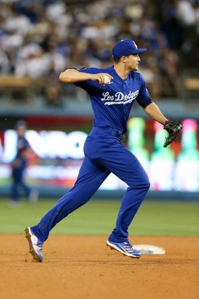 Corey Seager of the Los Angeles Dodgers looks to throw the ball during the game between the New York Mets and the Los Angeles Dodgers at Dodgers...