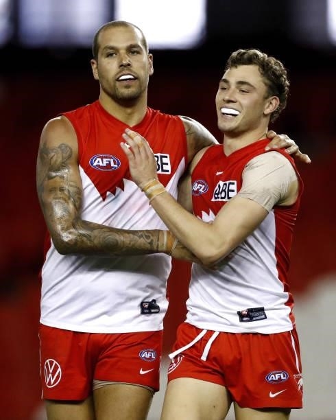 Lance Franklin of the Swans celebrates a goal with Will Hayward of the Swans during the 2021 AFL Round 23 match between the Sydney Swans and the Gold...