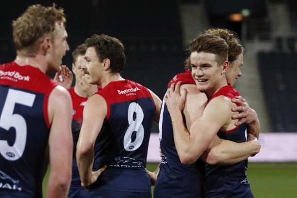 Bayley Fritsch of the Demons celebrates with Ben Brown of the Demons during the 2021 AFL Round 23 match between the Geelong Cats and the Melbourne...