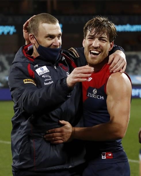 Simon Goodwin, Senior Coach of the Demons celebrates with Jack Viney of the Demons during the 2021 AFL Round 23 match between the Geelong Cats and...