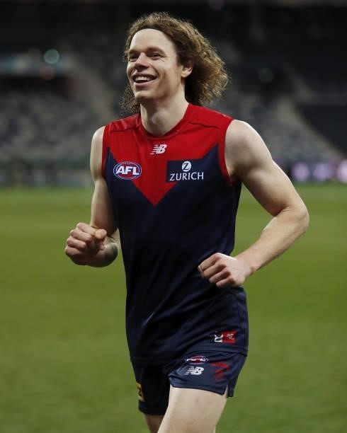 Ben Brown of the Demons leaves the field after a win during the 2021 AFL Round 23 match between the Geelong Cats and the Melbourne Demons at GMHBA...