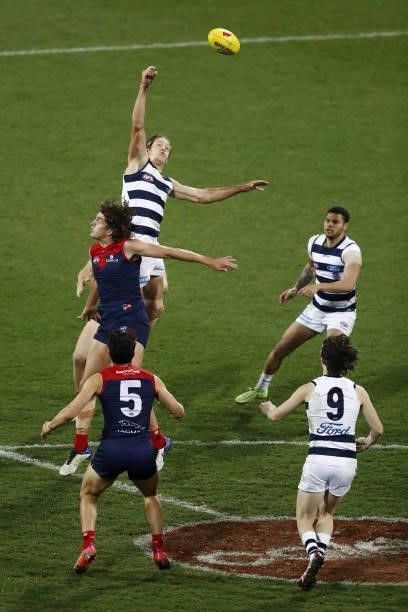 Rhys Stanley of the Cats wins the tap over Luke Jackson of the Demons during the 2021 AFL Round 23 match between the Geelong Cats and the Melbourne...